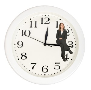 Business-Woman-Sitting-On-Clock